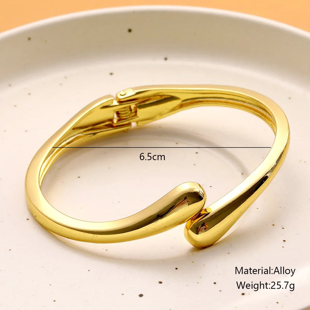 Women's Gold Plated Cuff Bangle | Sculptural Teardrop Open Bracelet | Minimalist Fluid Statement Jewellery